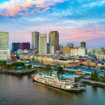 Riverboat and New Orleans skyline during daytime